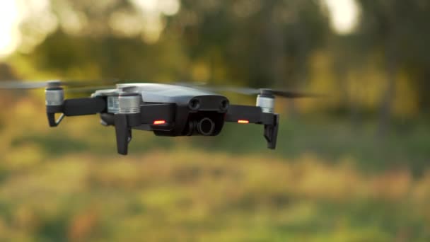 Drone hovering in air close up — Stock Video