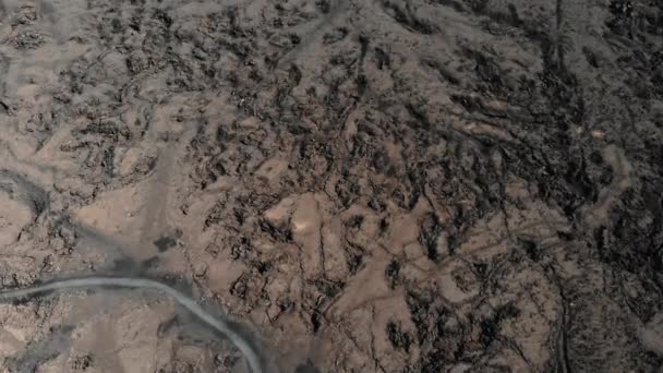 Vista aérea de lava congelada recubierta de superficie del suelo — Vídeo de stock