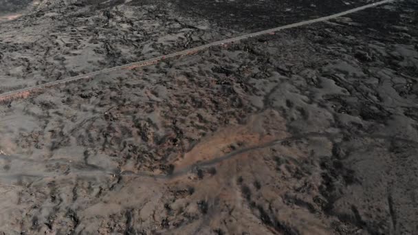 Oppervlakte bedekte bevroren lava vanuit de lucht — Stockvideo