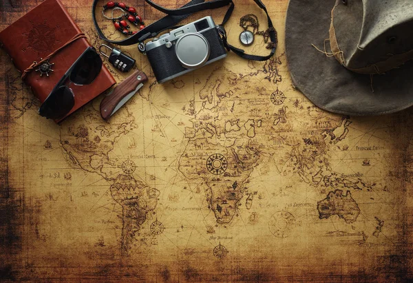 old map and vintage travel equipment / Travel concept