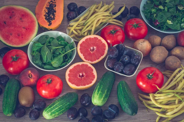 healthy diet, kitchen table full of fruits and vegetables