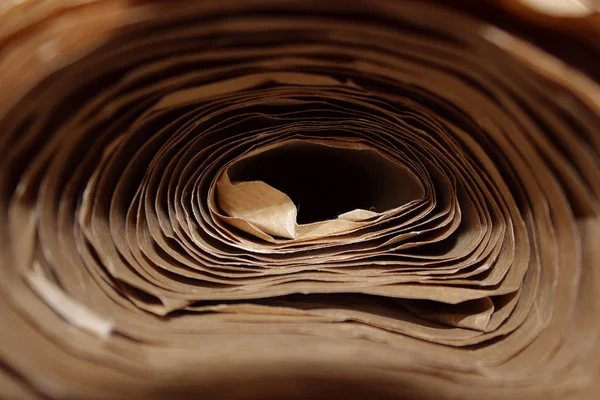 Paper Background. Abstract Paper Background. Cropped Shot Of Paper Roll. Craft Paper Folded In Roll. Wrapping Paper Roll.