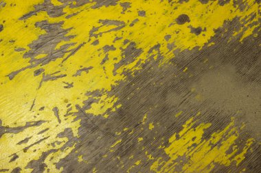 Arka plan. Sarı lekeler boya ile gri ahşap duvar. Ahşap doku Background.Colorful soyut arka plan boyalı.