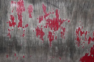 Arka plan. Gri ahşap duvar boya kırmızı lekeler ile. Ahşap doku Background.Colorful soyut arka plan boyalı.