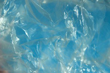 Renkli arka plan dokular. Plastik kötü kırpılmış bir kadeh. Plastik dokular.