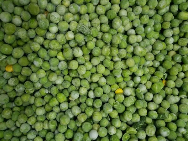 Green Food Background. Abstract Food Background. Green Frozen Peas At The Supermarket. Food Background With A Lot Of Copy Space For Text.
