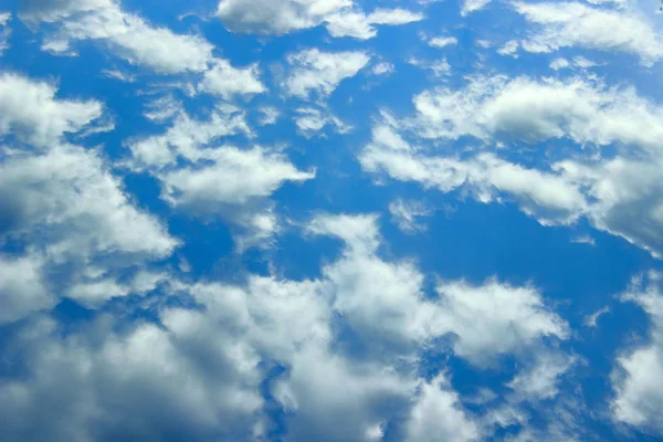 Blue Sky And White Clouds. Horizontal Shot Of A Beautiful Sky Background. Heaven,  Nature Concept.