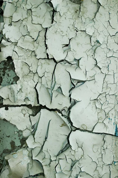 ひび割れたペイントテクスチャのぼやけたショット 抽象テクスチャの背景 白塗りの壁のクロップドショット — ストック写真
