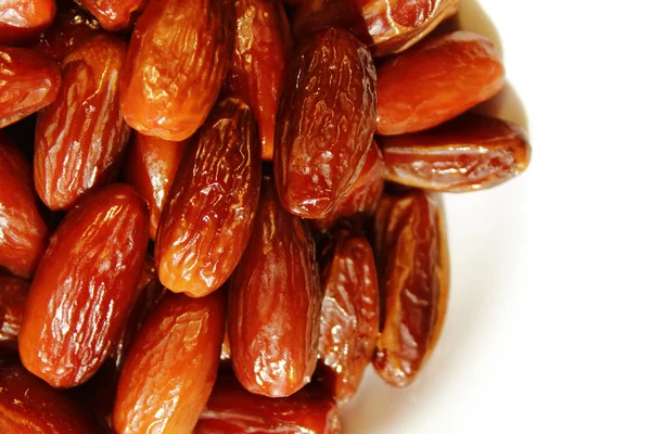Cropped shot of date fruit over white background. Healthy food concept. Date fruits background.