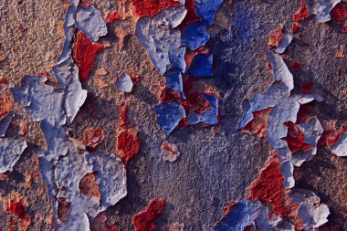 Duvar üzerinde eski kırık boya. Eski duvar dokusu, kırmızı ve mavi renkler, metin için kopya alanı çok soyut doku arka plan.