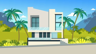 Tropikal bölgede modern bir ev. Dinlenme ve kiralık konutlar tatilde. Büyük pencereli beyaz bir ev, bir teras. Evin çimlerinde tropik bitkiler var..
