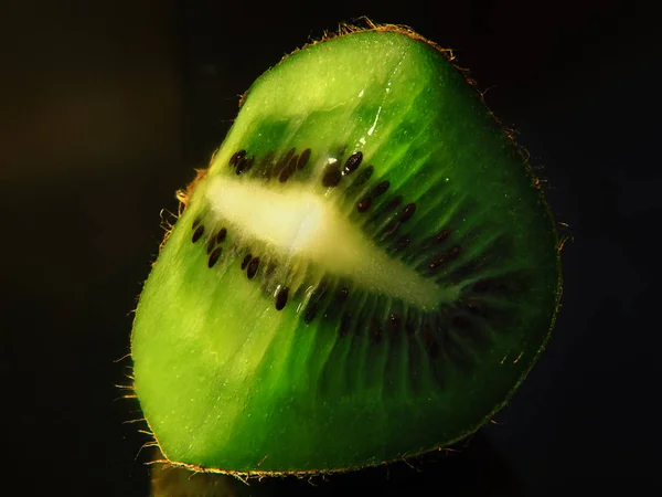 Kiwi Fruit Cut Macro Black — Stock Photo, Image