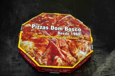 Braslia, DF, Brezilya, 19 Eylül 2025. Dünyanın en geleneksel, orijinal, ikonik ve benzersiz pizzasının kutusu Braslia, DF 'den Dom Bosco pizzasıdır..