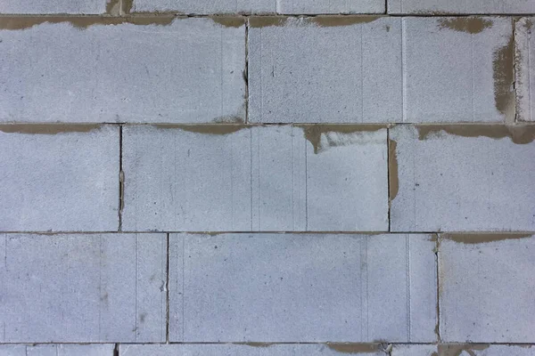 Beton bloğun arka plan dokusu. Köpüklü hafif beton.