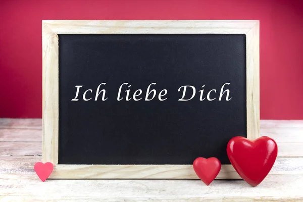 Wooden Blackboard Red Hearts Written Sentence German Ich Liebe Dich — Stock Photo, Image