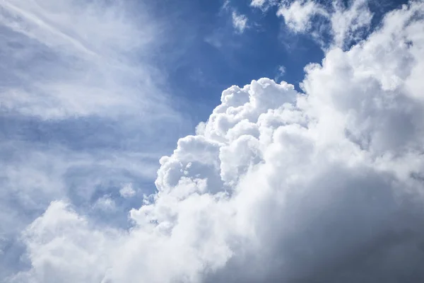 Clouds on a shiny blue sky.