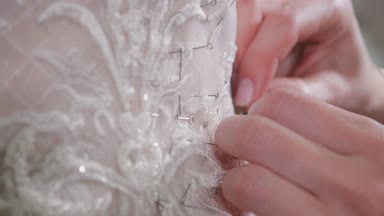 iğne ve iplik, Close-Up nakış deseni. Dikiş şık gelinlik donatımı. El yapımı