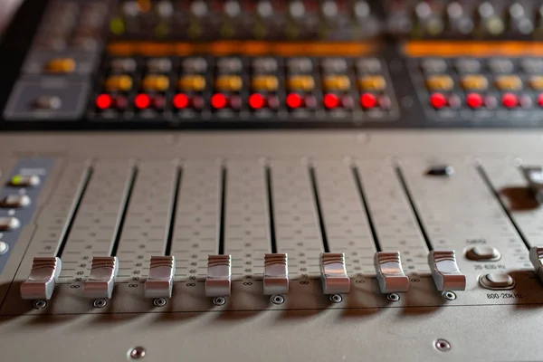 control Fader. Mixing console of light equipment operator at the concert. Sound recording studio mixing desk with engineer or music producer