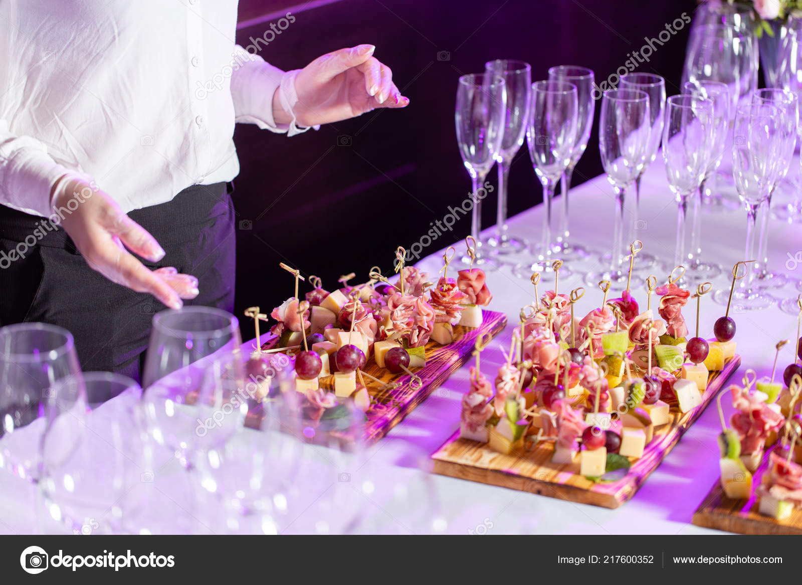The Waiter Prepared And Serves A Snack The Buffet At The