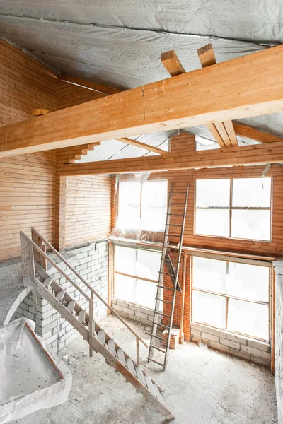 Attic floor of the house. overhaul and reconstruction. Working process of warming inside part of roof. House or apartment is under construction, remodeling, renovation, restoration. — Stock Photo, Image