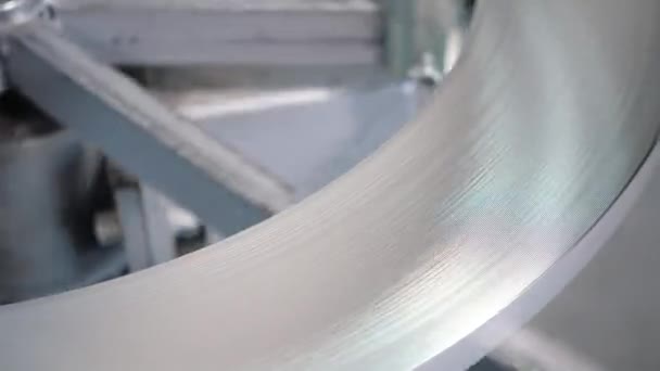 Steel sheet is wound on a roll on a special machine. Packed rolls of steel sheet, Cold rolled steel coils — Stock Video