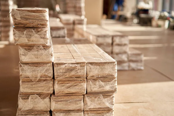 Panels of the parquet floor. Plywood boards on the industry. Preparation for the flooring of the parquet floor. Restoration of the floor in a restaurant or apartment.