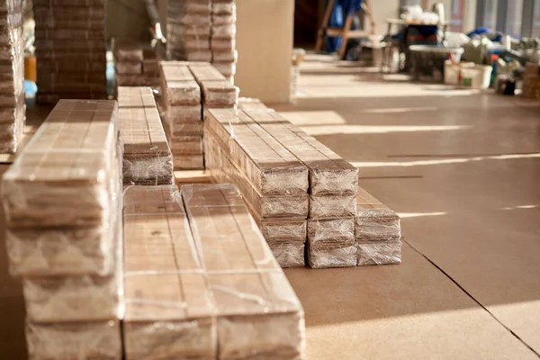 Panels of the parquet floor. Plywood boards on the industry. Preparation for the flooring of the parquet floor. Restoration of the floor in a restaurant or apartment.