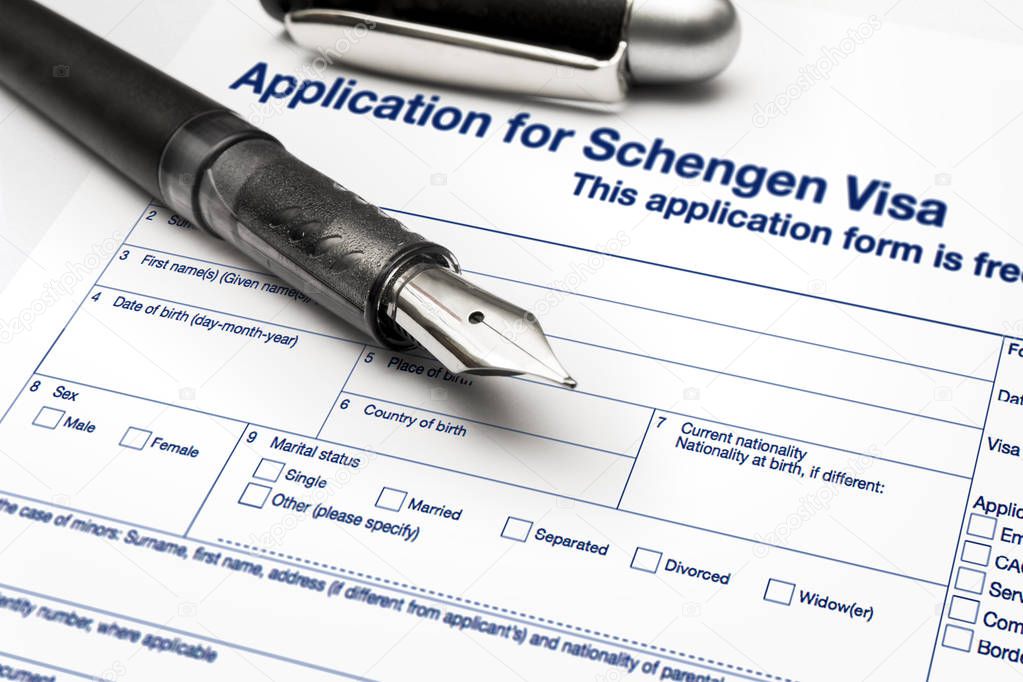 close up from a Application for Schengen visa and passport