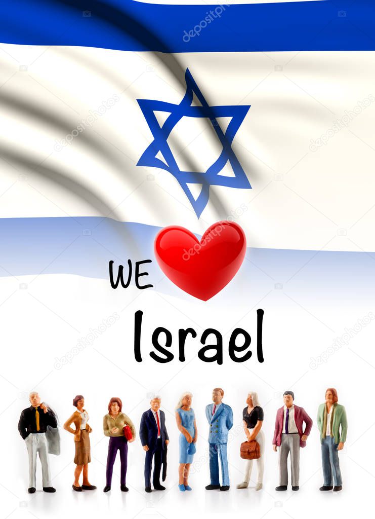 we love Israel, A group of people pose next to the Israeli flag.