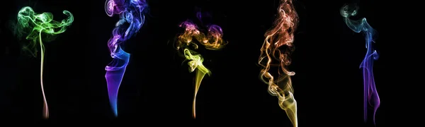 Fumaça colorida no fundo escuro — Fotografia de Stock