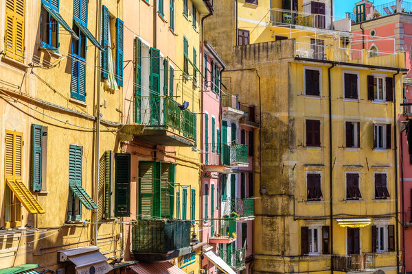 RIOMAGGIORE, ITALY - APRIL 29, 2017 - View of the colorful house of the famous town of Riomaggiore in Liguria, inside the famous Cinque Terre National Park.