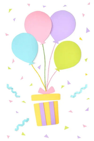 Gift and balloon paper cut on white background - isolated — Stock Photo, Image