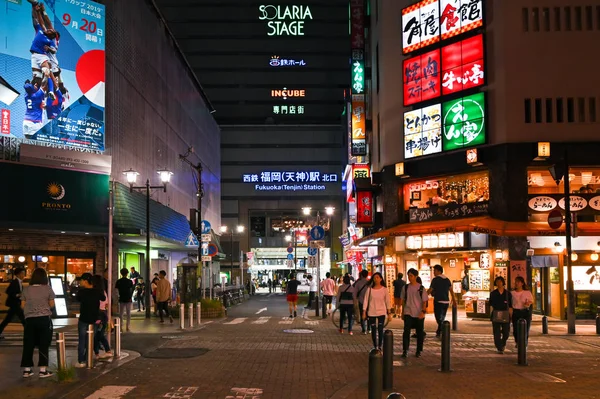 View Of The Street Of China With Buildings And People At Night Time Cars Exterior Stock Photo