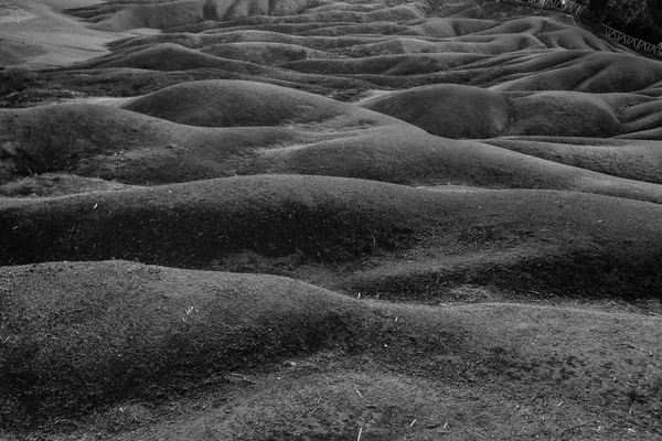 Black and white photo waves from gray soil — Stock Photo, Image
