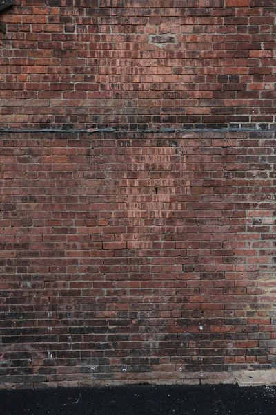 Gebouw is van baksteen die door beton verbonden is. — Stockfoto