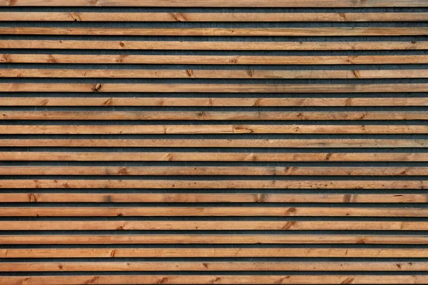 Tahta levhalı ya da kahverengi panelli yatay fotoğraf duvarı. İç mimar için arkaplan.