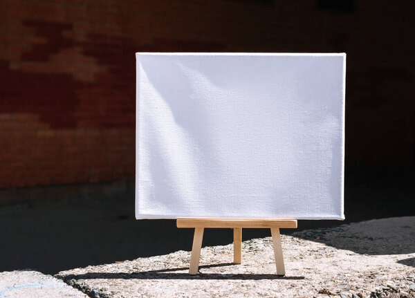 White empty mockup template poster canvas painting on stone and concrete background