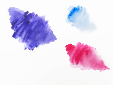 Açık arkaplanda soyut suluboya. Renkler kağıda sıçrıyor. El yapımı..