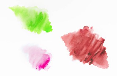 Açık arkaplanda soyut suluboya. Renkler kağıda sıçrıyor. El yapımı..