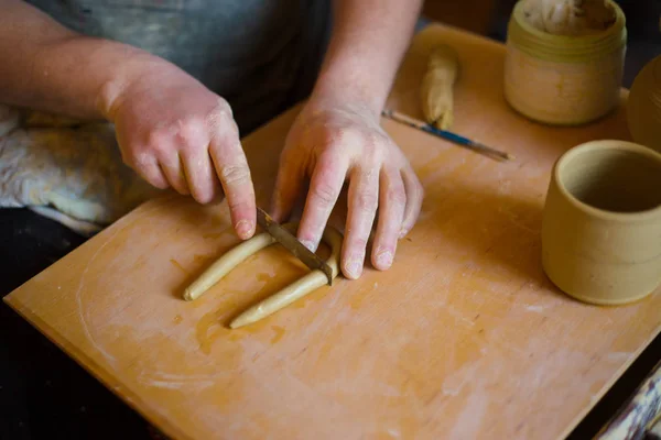 Professional male potter working in workshop, studio — Stock Photo, Image