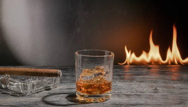 a glass of fire fired on a cigar glass