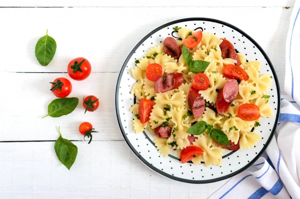 Tasty Pasta Farfalle Grilled Sausages Fresh Cherry Tomatoes Basil Plate — Stock Photo, Image