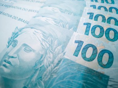 Brezilya para banknotunun yakın çekimi. 100 reais. Ekonomi kavramı
