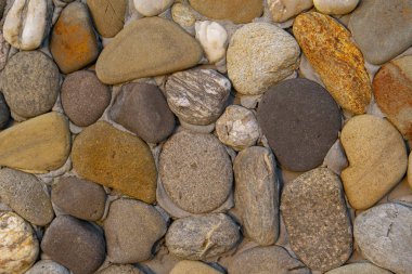 Taş arka plan. Farklı şekil ve renklerdeki taşlar.