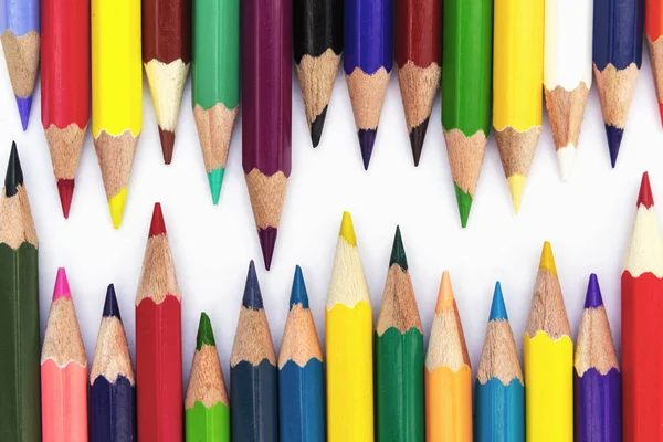 Pencils of different colors on a white background