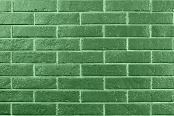 Brick background. The bricks are green.