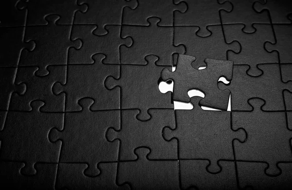 Puzzles Black Monochrome Cardboard Shapes Dark Background — Stock Photo, Image
