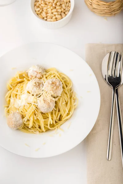 Spaghetti Creamy Chicken Meatballs Served White Plate Pine Nuts Top — Stock Photo, Image