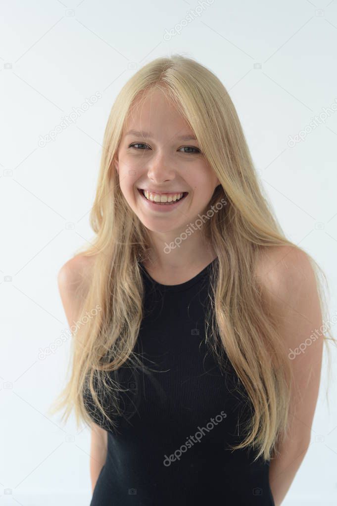 girl in black swimsuit with white hair smiling and showing emotions in the Studio