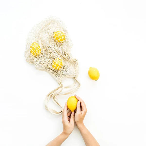 Woman Hands Holding Raw Lemon String Bag White Background Flat — Stock Photo, Image